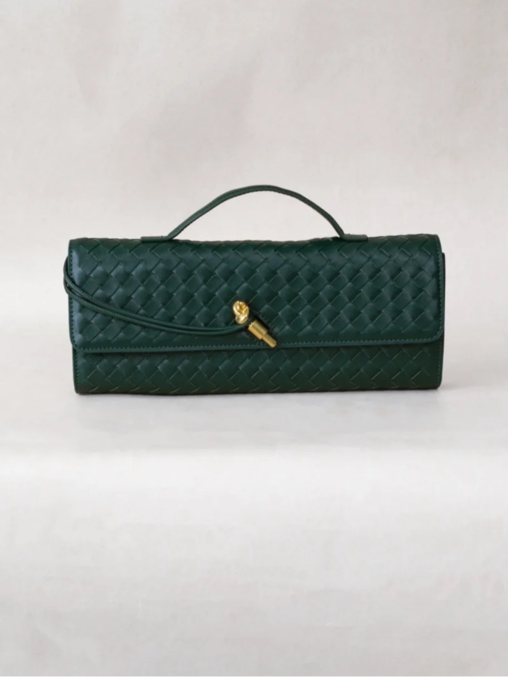 Green woven clutch